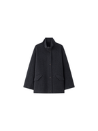 A stylish women’s winter coat with a zipper on both sides, featuring a stand-up collar and a short length; made of wool.