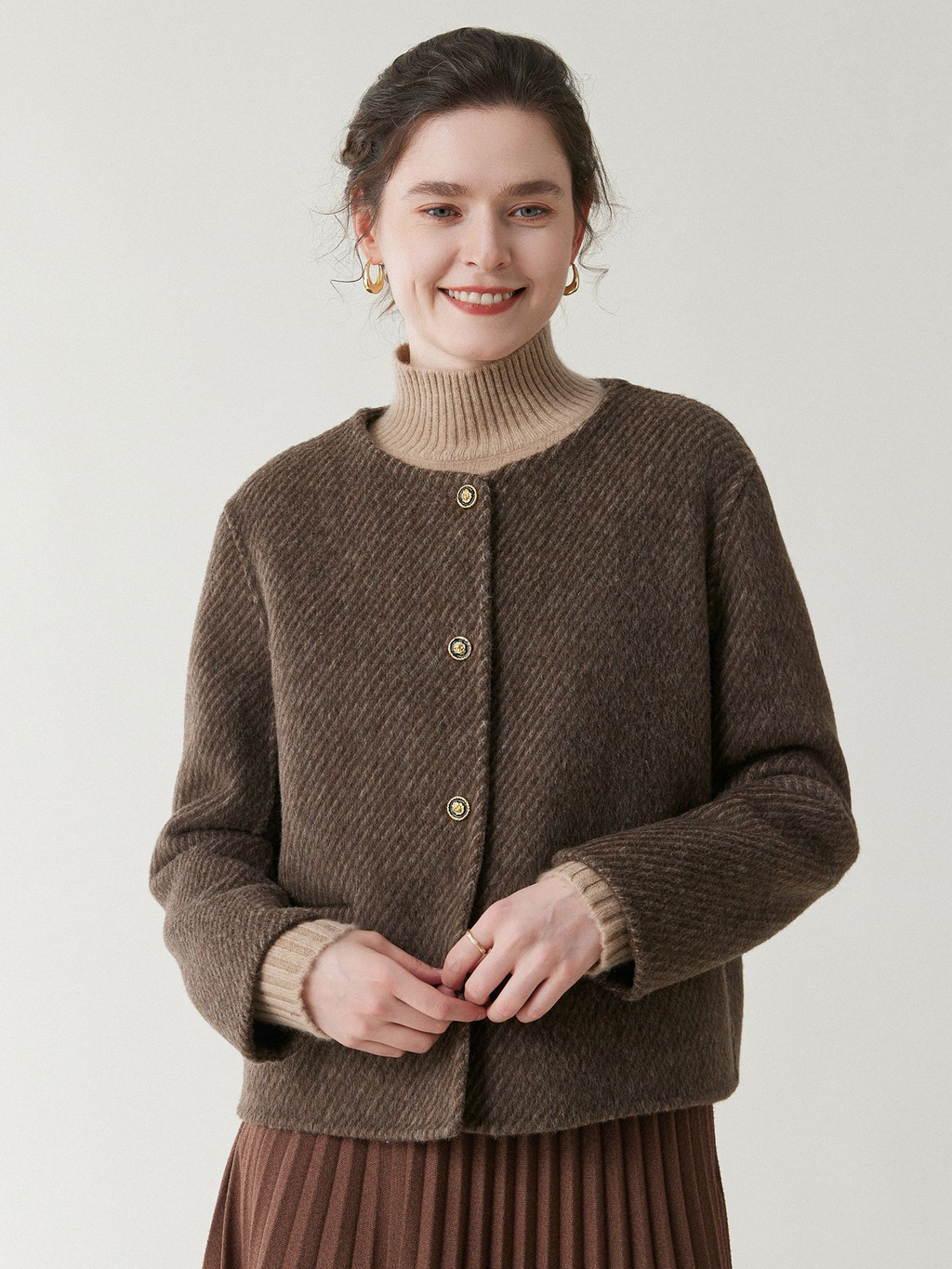 A stylish, short-length woolen coat for women in autumn and winter – featuring a double-sided design, a round neckline, and a retro style made from pure woolen fabric. Truly trendy!