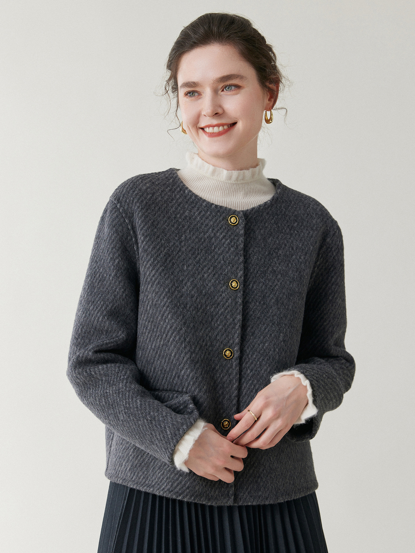 A stylish, short-length woolen coat for women in autumn and winter – featuring a double-sided design, a round neckline, and a retro style made from pure woolen fabric. Truly trendy!