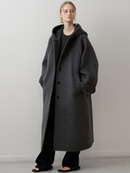 Women’s woolen coat with hood – a stylish, casual option for autumn and winter.