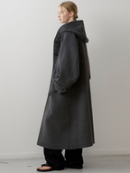 Women’s woolen coat with hood – a stylish, casual option for autumn and winter.