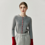 A stylish, lightweight cashmere sweater for autumn and winter – featuring a round neckline, versatile styling, and colorful knitted cuffs.