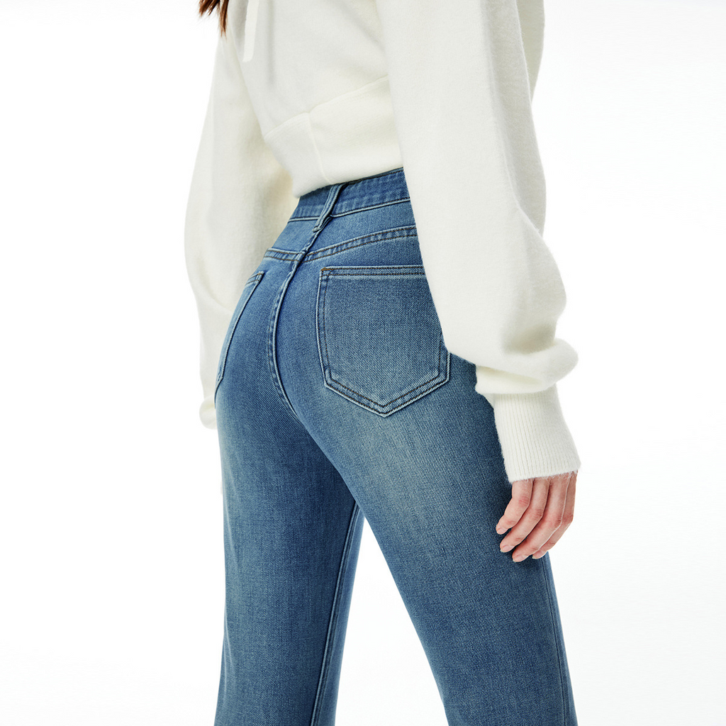 High end 2025 autumn and winter new women's clothing with four sided elastic and slightly flared slim fit denim pants in dark blue, showing height and slimming trend