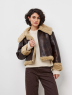 Short, autumn/winter jacket with fur-trimmed lapels and one-piece design for women