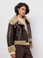 Short, autumn/winter jacket with fur-trimmed lapels and one-piece design for women