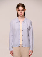 Women’s knitted long-sleeved wool sweater in a plain color – a stylish, warm, and comfortable garment.