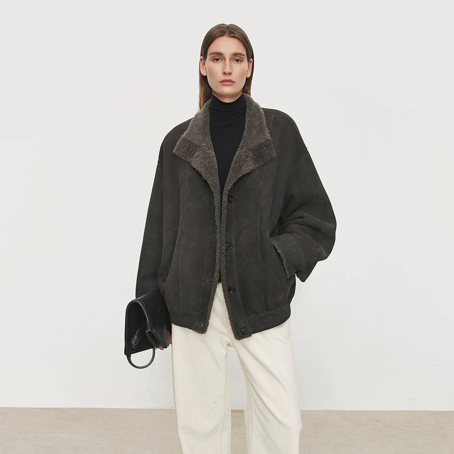 Women’s coat with stand-up collar and fur-trimmed woolen jacket