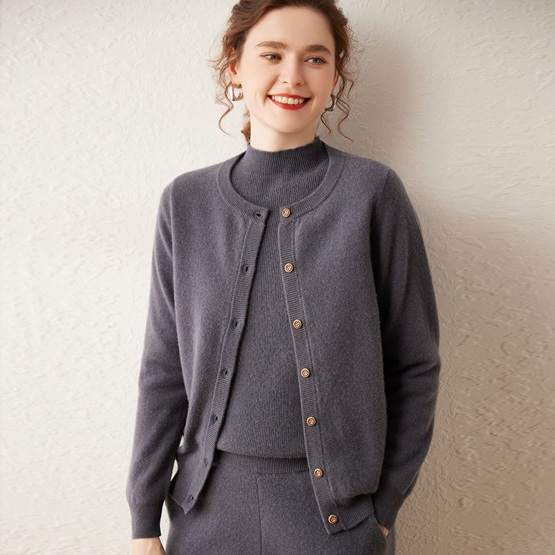 Women’s cashmere sweater with round neckline; a loose, solid-colored sweater that helps to slim the figure – a new autumn fashion item.