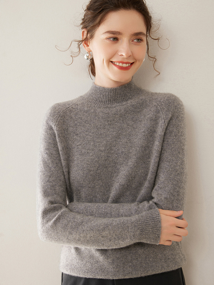Thick, loose-fitting sweater made of pure cashmere, featuring a semi-high collar; designed to slim the figure and is extremely comfortable to wear on the skin.
