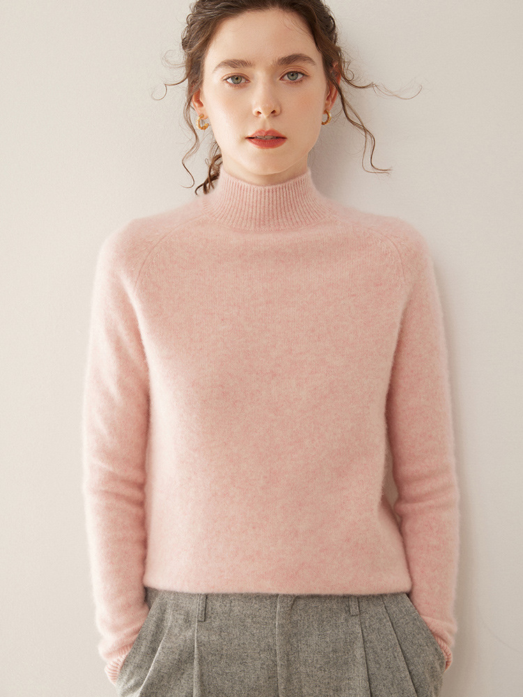 Thick, loose-fitting sweater made of pure cashmere, featuring a semi-high collar; designed to slim the figure and is extremely comfortable to wear on the skin.