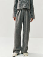 Cashmere and woolen trousers – high-waisted, straight-cut, and draping in style; designed for autumn and winter, with thickened knitted fabric.