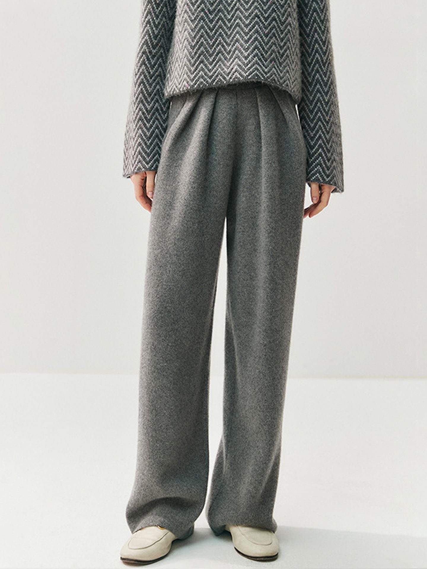 Cashmere and woolen trousers – high-waisted, straight-cut, and draping in style; designed for autumn and winter, with thickened knitted fabric.