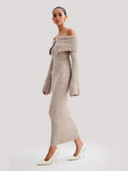 Elegant, stylish dress with a scoop neckline and bare shoulders; a luxurious knitted dress.