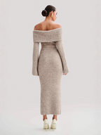 Elegant, stylish dress with a scoop neckline and bare shoulders; a luxurious knitted dress.