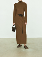 A new autumn/winter dress for women, made of slightly shrunken wool with a raised-wool texture and featuring a long or short length, as well as a high-neck design.