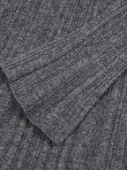 Elegant and graceful gray sweater dress with high collar, long sleeves, and a knitted woolen underlayer, perfect for autumn and winter.