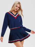 Long-sleeved sports top for women, designed for tennis play. Features a large V-neck and a stylish, casual design.