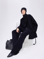 New winter arrival: Asymmetrical stand-up collar mid-length wool coat with a slanted placket.